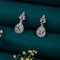 Minimello pear zircon earring.