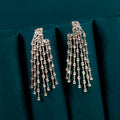Rippling statement dangler earring